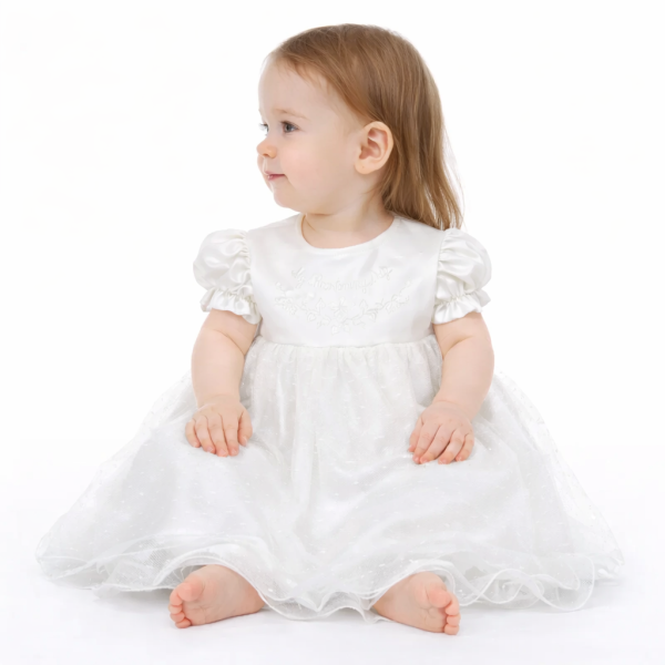 Baby girl in christening gown